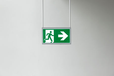 Closeup of modern illuminated emergency exit sign