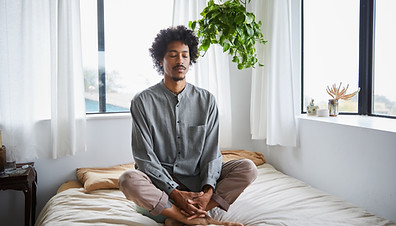 Meditating on Bed