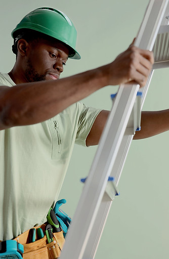 Man Climbing Ladder