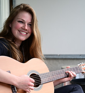 Woman Playing Guitar