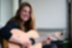 Woman Playing Guitar