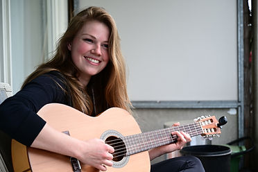 Woman Playing Guitar