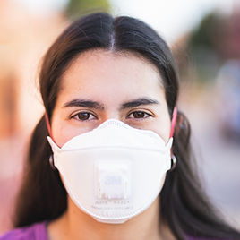 Woman with a Face Mask