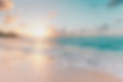 Ocean surf and sand at sunset with Sunstone Psychology Group Logo Begin Your Journey With In-Person Therapy and Online Therapy at Sunstone Psychology Group Get Started