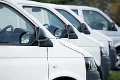 row of white vans