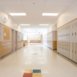 Lockers in empty high school corridor