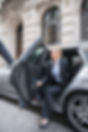 businesswoman exiting car