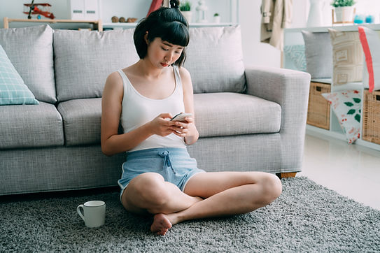 Person Staring At Smartphone