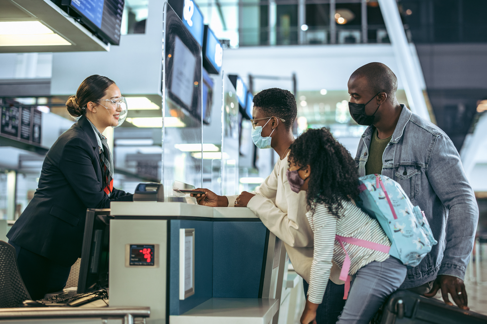 Customer Service executive helping travellers