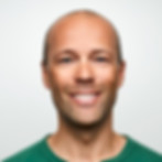 Smiling client after faucet repair and shelf installation by handyman service