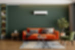 A fully furnished living room with an air conditioner mounted on the wall