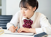 Writing on a Notebook