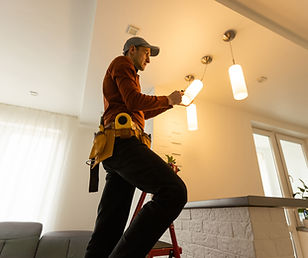 Electrician Fixing Light
