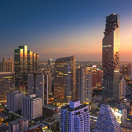 Its hard to see where things are going for Thailand right now Thailand, long viewed as a stable economic performer in Southeast Asia, is now confronting a murkier and more uncertain future. While short-term indicators may sometimes hint at resilience, the broader outlook for the country's economy in the medium to long term is far less encouraging. From persistent structural weaknesses to escalating global trade tensions, multiple pressures are converging to create an increasingly complex economic environment for Thailand. This article explores the underlying economic dynamics shaping the country’s trajectory, beyond temporary fluctuations to the enduring risks and structural fragility. A challenging growth landscape Thailand’s growth prospects have become significantly constrained in recent years. Although the country emerged from the pandemic with some renewed momentum, recent projections for gross domestic product (GDP) growth suggest a notable loss of steam. National economic planning authorities now expect GDP growth to fall between 1.3% and 2.3% in 2025, even after accounting for additional government stimulus. This would mark one of the weakest performances since the depths of the pandemic and raises deeper concerns about the country's long-term growth potential. External challenges are playing a major role in Thailand’s softening outlook. With trade protectionism on the rise—particularly from key markets—Thailand faces increased risks to its export-driven economy. The possibility of high tariffs, especially from the United States, threatens to undercut machinery and electronics exports, which have historically formed the backbone of Thai trade. Export growth forecasts have been lowered repeatedly, and private investment is now expected to shrink as firms hesitate to commit capital in a more volatile and uncertain environment. Domestic fragilities persist Thailand’s domestic economy is also grappling with persistent vulnerabilities. Household and corporate debt remain at elevated levels, limiting consumer and business confidence. Despite some initial gains in private consumption following the pandemic, spending growth has begun to slow again. Even though government stimulus measures may provide a short-term cushion, they do little to address underlying structural imbalances that continue to weigh down demand. Moreover, public finances are showing signs of stress. As policymakers attempt to reignite growth through fiscal interventions, there is growing concern about the rising level of public debt. While stimulus spending may support short-term consumption and infrastructure activity, it also raises questions about long-term fiscal sustainability. Credit rating agencies have already adjusted their outlook on Thailand’s fiscal position in response to mounting pressures. Institutional and monetary constraints The capacity of Thailand’s central bank to stimulate the economy through interest rate cuts has also become limited. Following a series of reductions, the benchmark interest rate now sits at a relatively low level, restricting the scope for further easing. Although the country continues to hold substantial foreign exchange reserves—providing some resilience against external shocks—monetary policy alone may not be sufficient to reverse the downward trend in economic activity. Recent discussions around the legal structure governing foreign exchange reserves have further complicated the picture. Moves to consolidate separate reserve accounts under a single framework have raised fears about weakening the institutional safeguards designed to protect these assets. While Thailand has come a long way since the 1997 financial crisis, such debates reflect lingering anxieties about the country’s long-term economic security. Regional competition and shifting global dynamics Thailand’s economic model, heavily reliant on manufacturing, tourism, and exports, is increasingly being tested by shifting global conditions and rising regional competition. Neighbouring economies, such as Vietnam and Malaysia, are drawing in higher levels of foreign direct investment, particularly in high-tech sectors like data centres and digital manufacturing. In contrast, Thailand is seeing a decline in private investment, partly due to tighter credit conditions and lingering concerns over domestic reform momentum. Tourism, a critical engine of growth for Thailand, is also showing signs of strain. Despite a gradual recovery in visitor numbers, forecasts have been scaled back amid weaker demand from key markets such as China. While moderate increases in arrivals are expected, they may not be sufficient to offset other drags on the economy, particularly if global travel continues to be affected by broader economic slowdowns. Long-term pressures and policy uncertainty Looking further ahead, Thailand faces additional challenges that could limit its ability to achieve sustainable growth. Technological transformation, demographic ageing, and a need for structural reforms all loom large. The country has yet to fully adapt its economic model to the digital age, and productivity gains have remained limited. Without deeper investment in innovation, skills development, and infrastructure, Thailand risks being left behind in an increasingly competitive global economy. Policy uncertainty is another significant factor clouding the outlook. Trade negotiations with key partners remain unresolved, and any escalation in tariff measures could trigger further disruptions. At the same time, there is limited clarity on the direction of long-term domestic reforms needed to boost competitiveness and resilience. While political leaders have pledged continued support for the economy, actual policy execution has at times fallen short of expectations. Summary Thailand’s medium to long-term economic outlook remains deeply uncertain. External threats such as global trade tensions and tariffs are compounding domestic challenges, including high debt levels, weak private investment, and slowing consumption. Despite strong foreign reserves and limited government stimulus, underlying structural problems and institutional constraints continue to weigh heavily on the country’s growth trajectory. Without a clear and coordinated response to these enduring pressures, Thailand risks facing a prolonged period of low growth and heightened vulnerability to global shocks. Note: This article provides general information only and does not constitute investment advice. Readers are encouraged to conduct their own research and consult a qualified financial advisor before making any investment decisions. เศรษฐกิจไทยมีแนวโน้มไม่ชัดเจนในระยะกลางถึงยาว