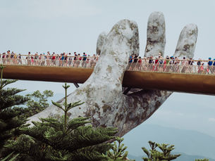 hand holding bridge so people can walk