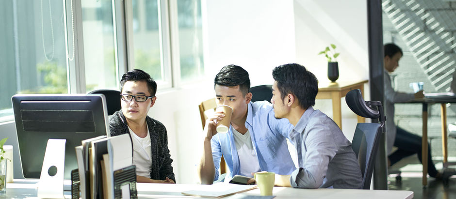 Employees Working While having Coffee