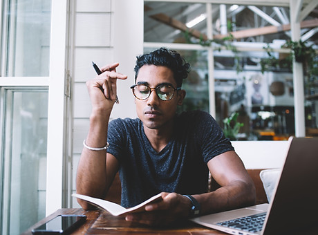 A Young Man with a Notebook