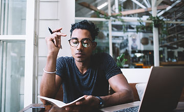 A Young Man with a Notebook
