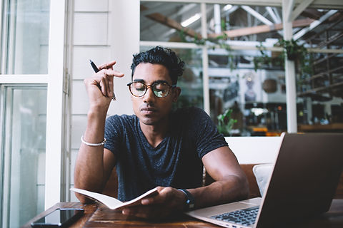 A Young Man with a Notebook