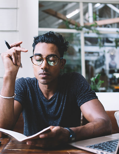 A Young Man with a Notebook