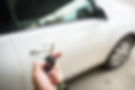 Men's hand presses on the remote control car unlock systems