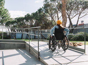 Commercial ADA-compliant ramp with slip-resistant surface and handrails in Ventura County