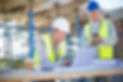 an architect or building inspector working on a large residential building