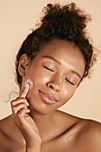 Applying Facial Cream