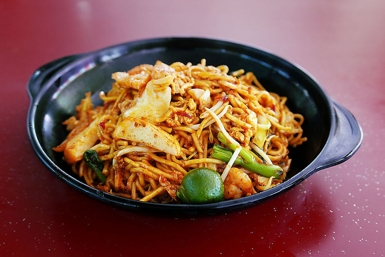 Close-Up Of Fried Noodles In Cooking Pan On Table