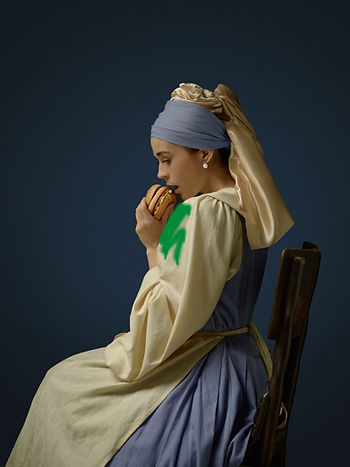 A girl eating a hamburger with hesitation. It looks like inspired by the paintings: Girl with a Pearl Earring by Johannes Vermeer