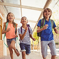 Children running at school