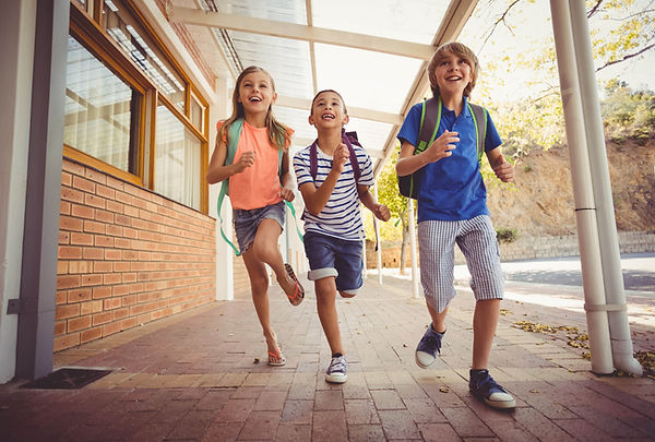 Children running at school