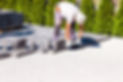 A professional laying concrete paving stones