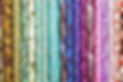 Rolls of colourful fabric as a vibrant background image