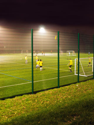 Modern floodlit 3G football pitches used for high-intensity evening training sessions in Dorset.