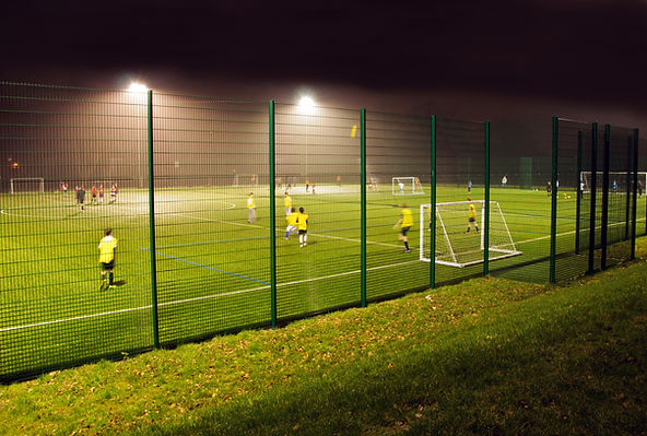 Football match being played at night