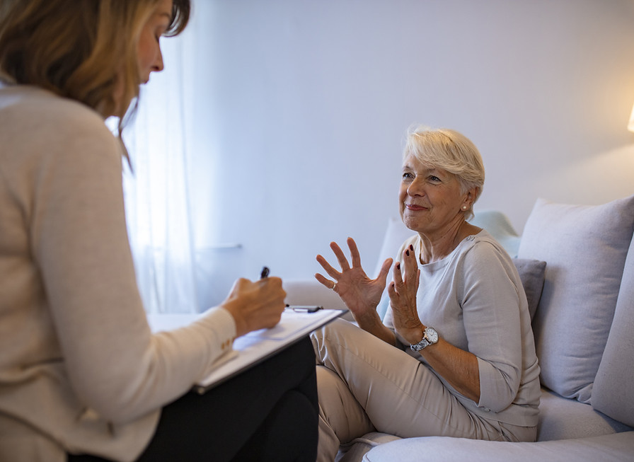 Support Provider discussing with client their needs and communicating with m