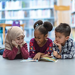 Children of different race learning together