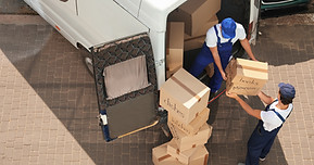 Movers Unloading Van