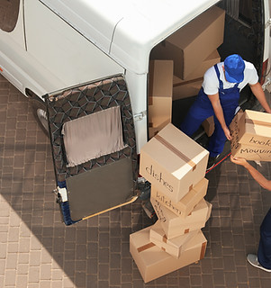 Movers Unloading Van