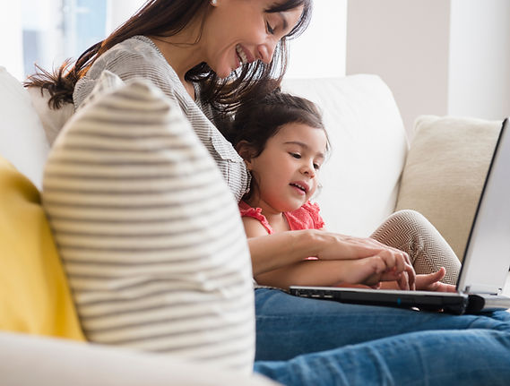 Mother and Daughter Using Laptop