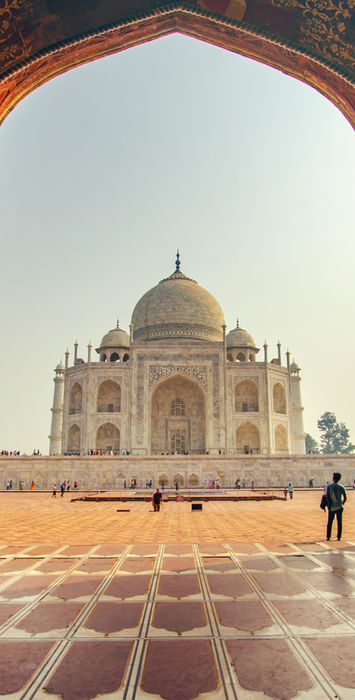 Taj Mahal view through ornate archway