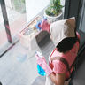 Person Cleaning Window