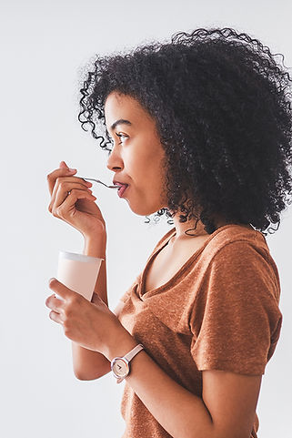 Woman Having Yogurt