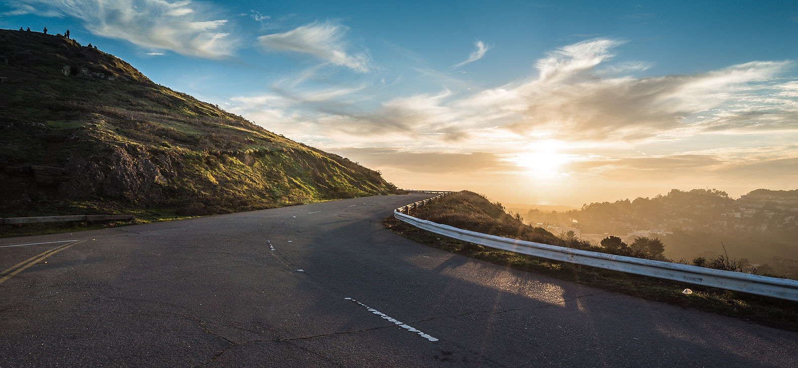 Sunlit Mountain Road