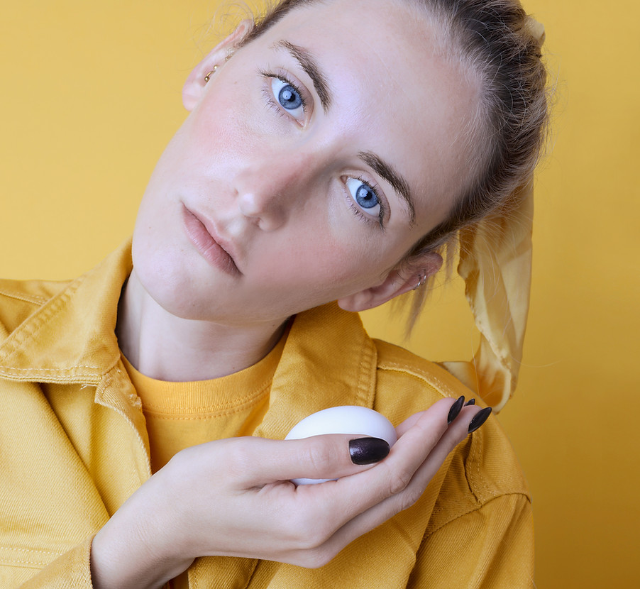 Girl Holding an Egg