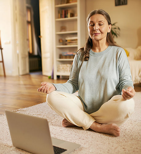 Woman Meditating at Home
