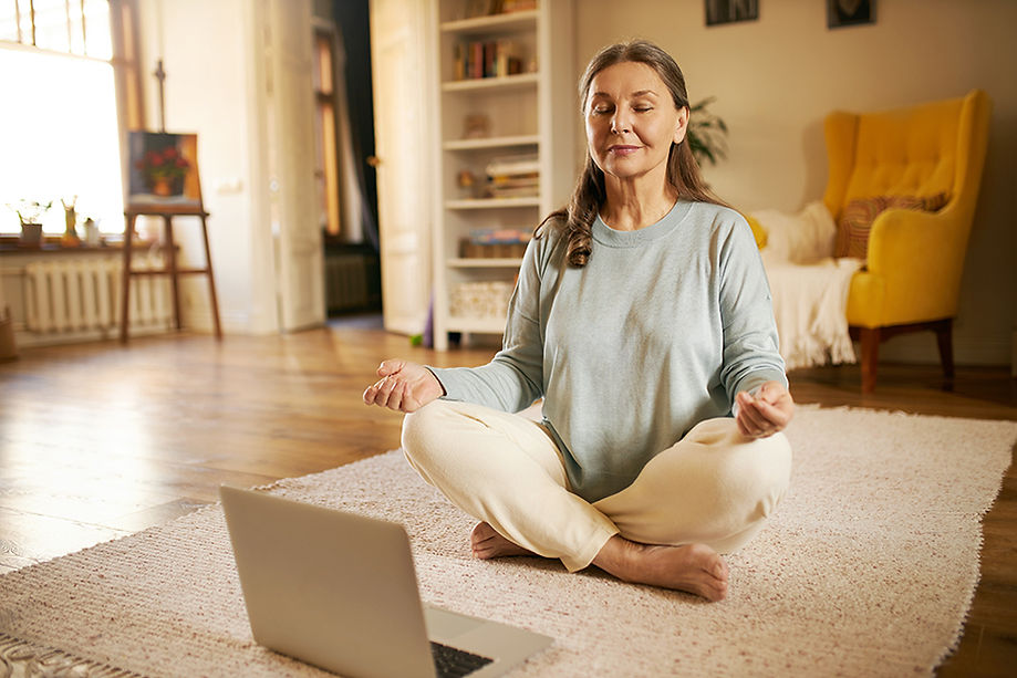 Woman Meditating at Home