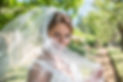 smiling woman in veil