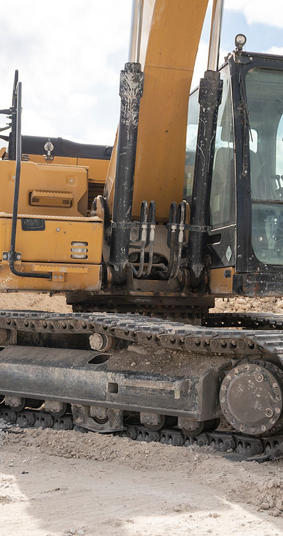 Ace Track chains installed on construction excavator